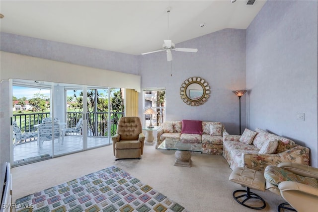 living room with ceiling fan, carpet flooring, and high vaulted ceiling