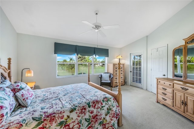 carpeted bedroom with lofted ceiling, access to exterior, and ceiling fan