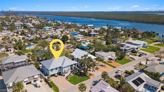 bird's eye view with a water view