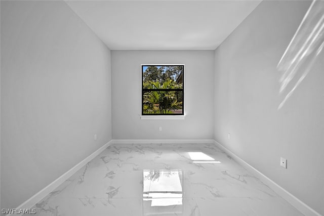 view of tiled empty room