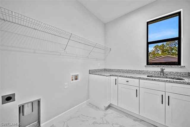 laundry area with baseboards, hookup for an electric dryer, a sink, washer hookup, and marble finish floor