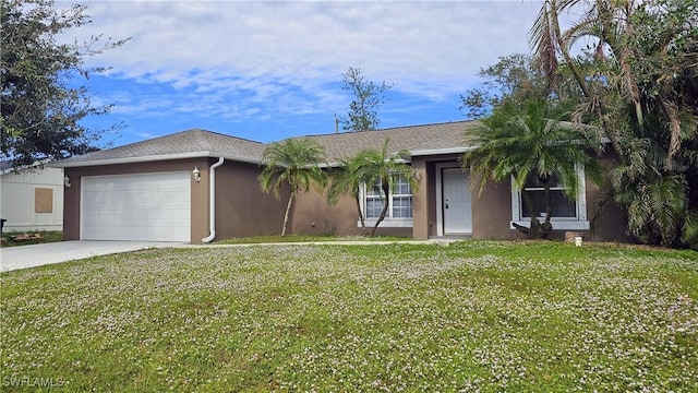 ranch-style home with a front yard and a garage