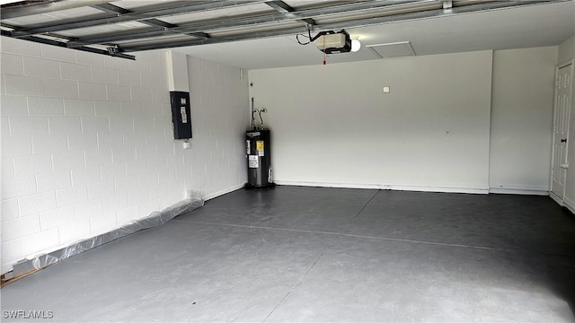 garage featuring a garage door opener and water heater