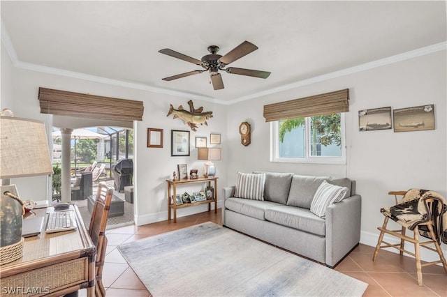 tiled living room with crown molding, plenty of natural light, and ceiling fan