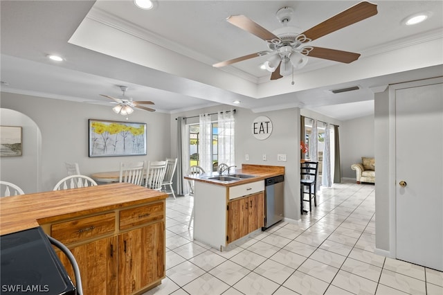 kitchen featuring light tile patterned floors, dishwasher, ceiling fan, sink, and ornamental molding