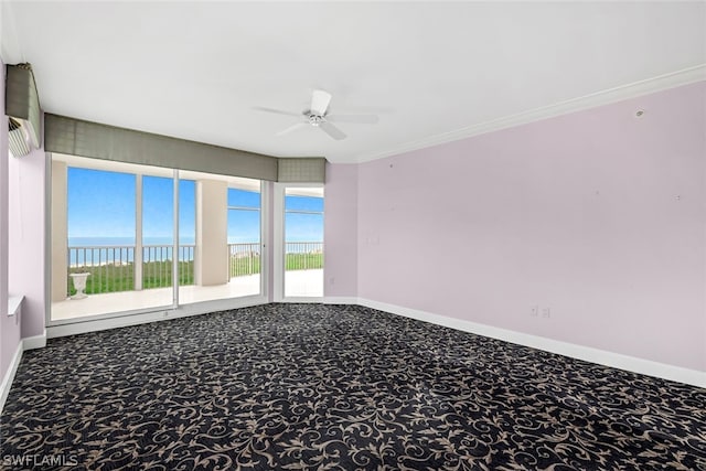 carpeted spare room with a wealth of natural light, baseboards, ornamental molding, and a ceiling fan