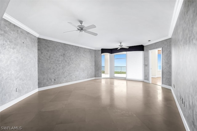 unfurnished room featuring baseboards, crown molding, and wallpapered walls