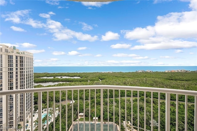 balcony featuring a water view