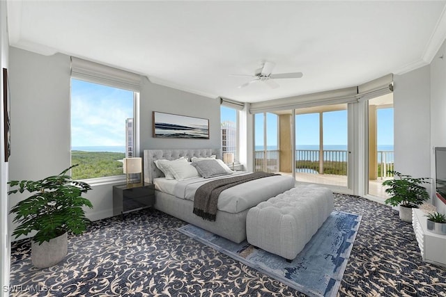 bedroom featuring carpet flooring, ceiling fan, crown molding, and access to outside