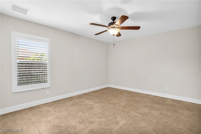 empty room featuring ceiling fan