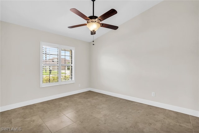 unfurnished room with ceiling fan and vaulted ceiling