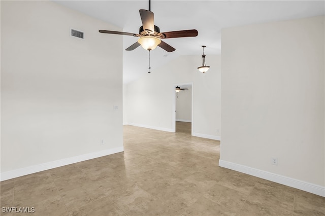 spare room featuring ceiling fan and lofted ceiling