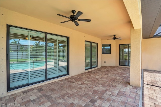 view of patio with ceiling fan