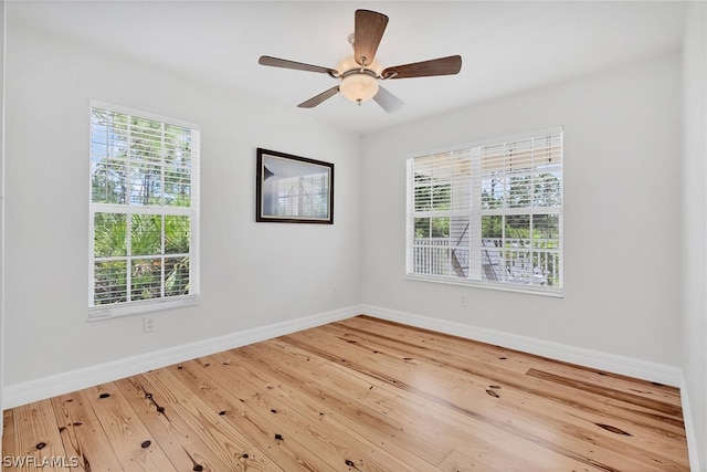 unfurnished room featuring ceiling fan and light hardwood / wood-style floors