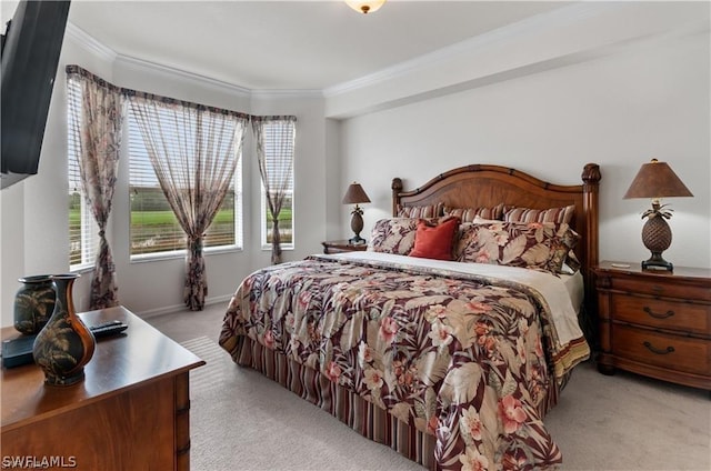 carpeted bedroom with crown molding