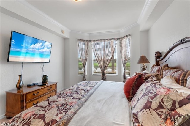 bedroom featuring crown molding