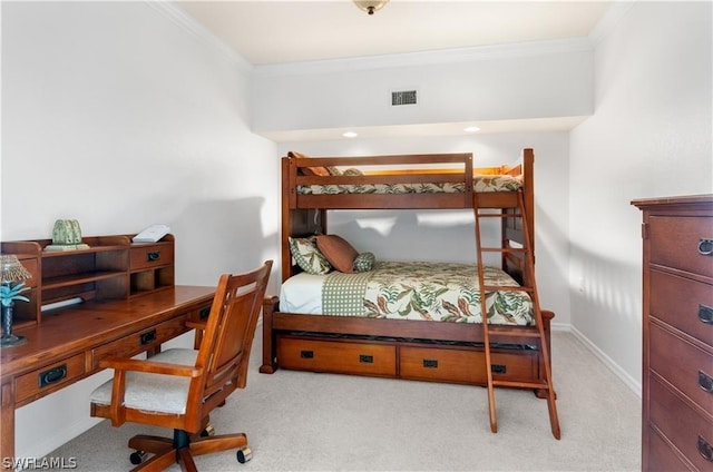 bedroom featuring crown molding and light carpet