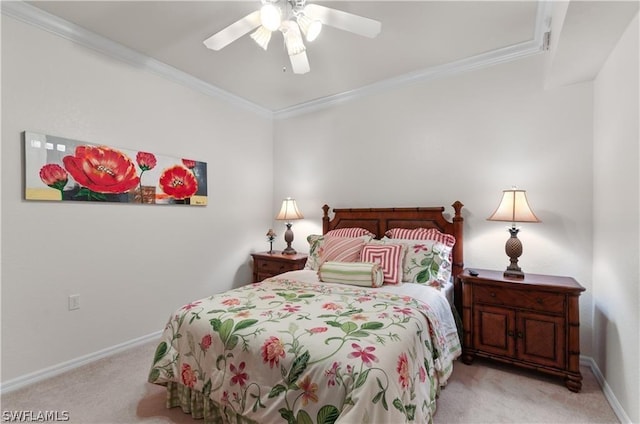 carpeted bedroom with crown molding and ceiling fan