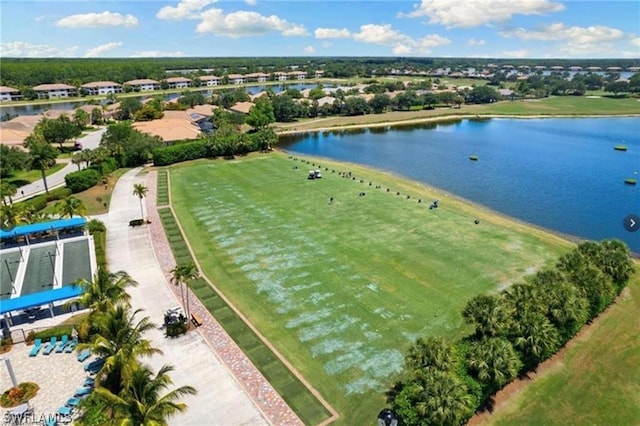 bird's eye view with a water view