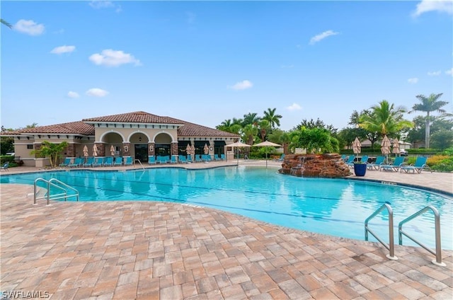 view of pool featuring a patio area