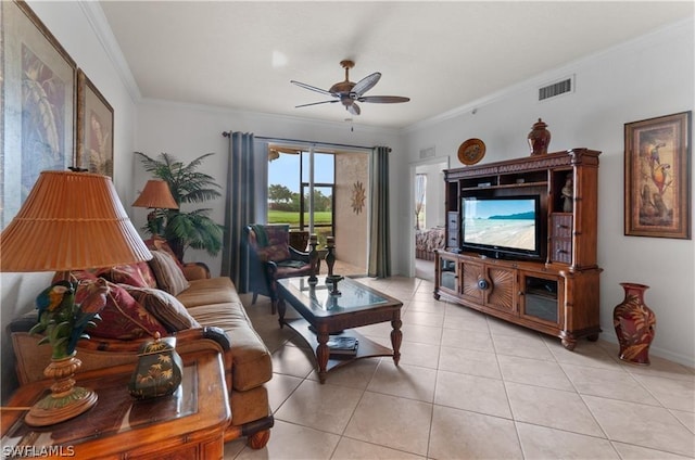 tiled living room featuring crown molding and ceiling fan