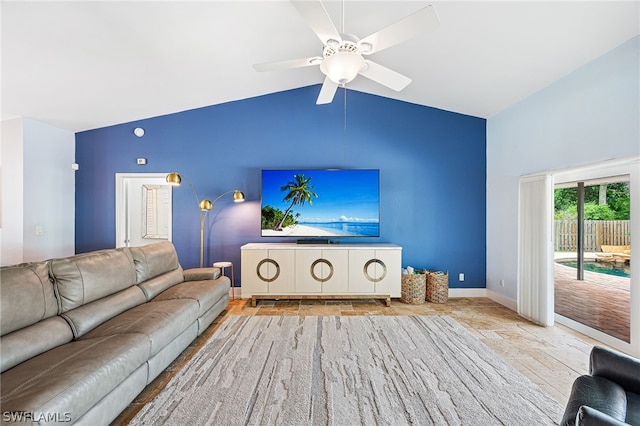 unfurnished living room with vaulted ceiling and ceiling fan