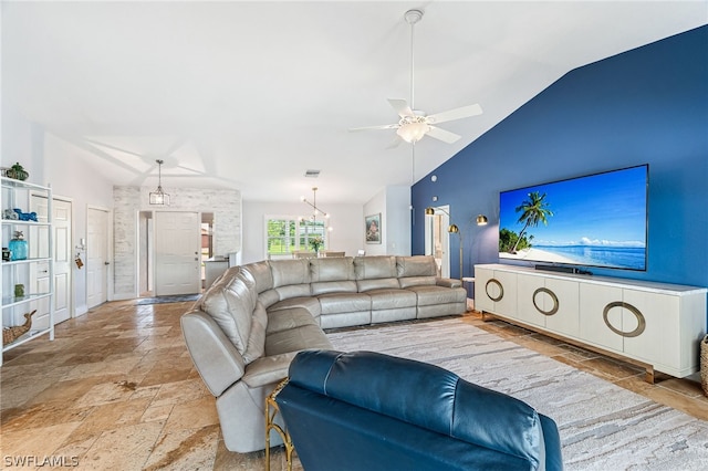 living room featuring vaulted ceiling and ceiling fan with notable chandelier