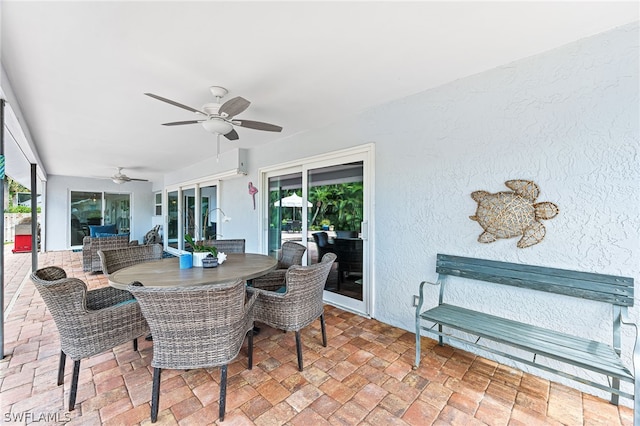 view of patio featuring ceiling fan