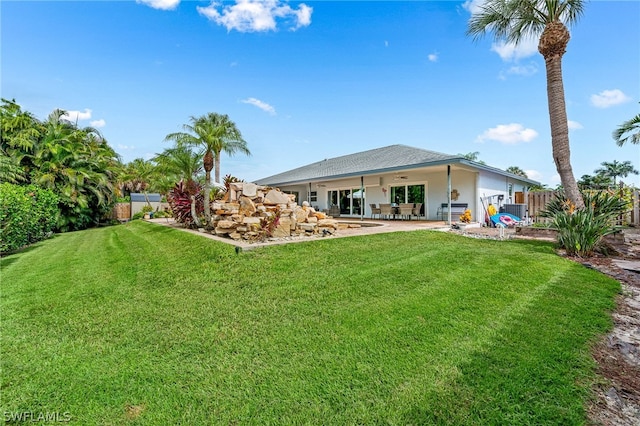 view of yard with a patio area