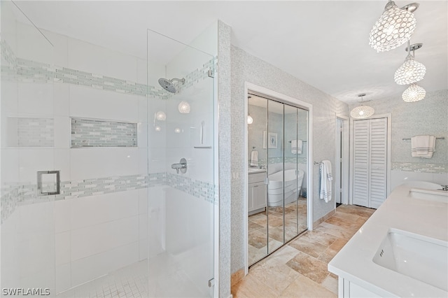 bathroom with vanity and an enclosed shower