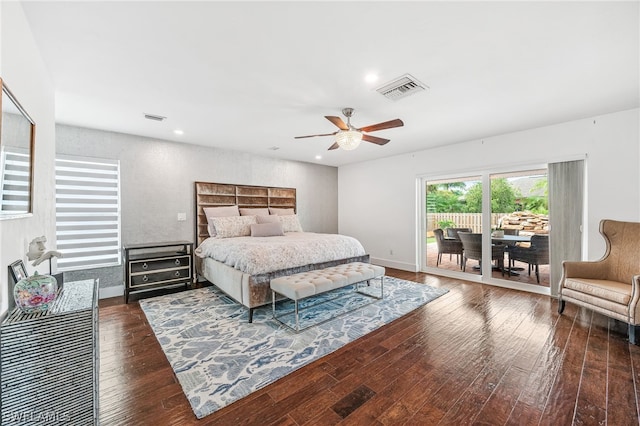 bedroom featuring access to exterior, dark hardwood / wood-style floors, and ceiling fan