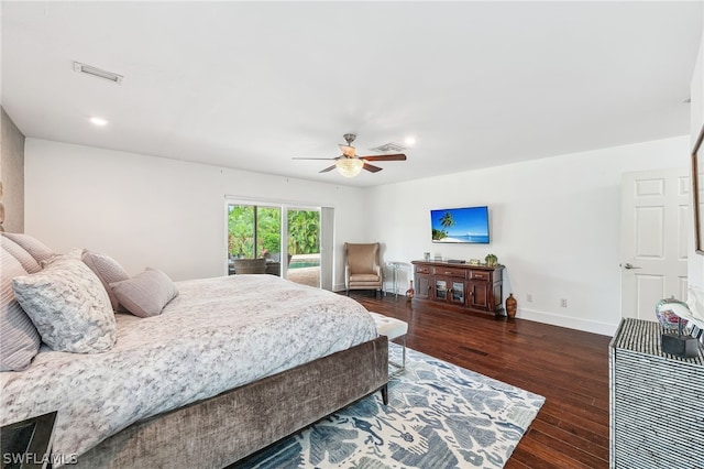 bedroom with ceiling fan and dark hardwood / wood-style flooring