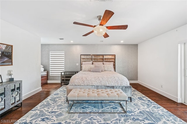 bedroom with dark wood-type flooring and ceiling fan