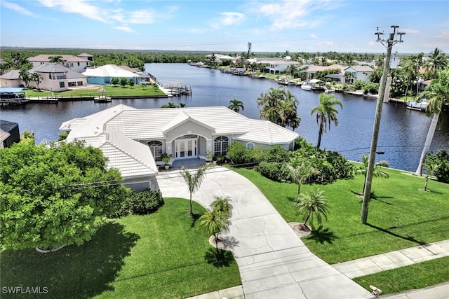 birds eye view of property featuring a water view