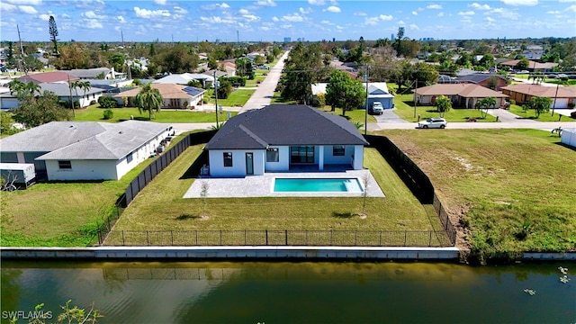 drone / aerial view with a water view