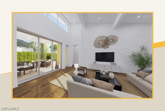 living room with a towering ceiling, hardwood / wood-style floors, and beamed ceiling