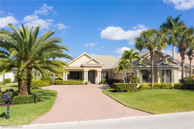 view of front of home with a front yard