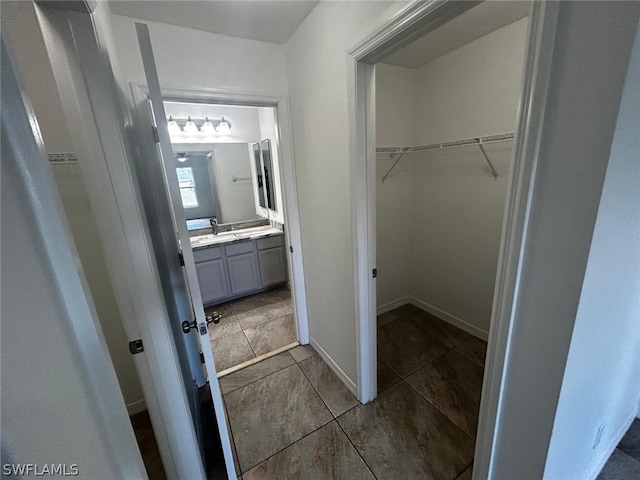 bathroom featuring vanity and tile patterned floors