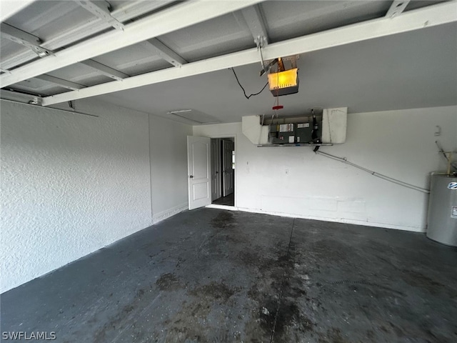 garage with a garage door opener and water heater