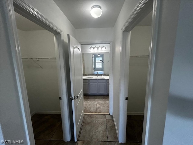 bathroom featuring tile patterned floors and vanity