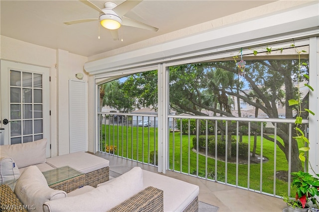 sunroom / solarium with ceiling fan