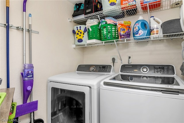 laundry area featuring washer and clothes dryer