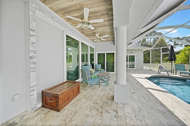 exterior space featuring wood ceiling, ceiling fan, and vaulted ceiling