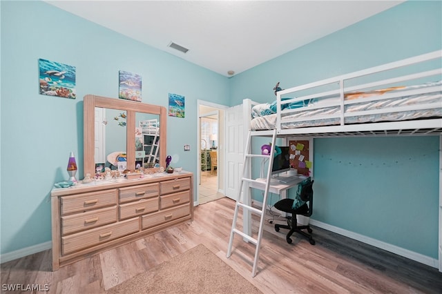 bedroom featuring light hardwood / wood-style flooring