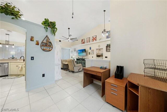 office with ceiling fan, vaulted ceiling, and light tile patterned floors