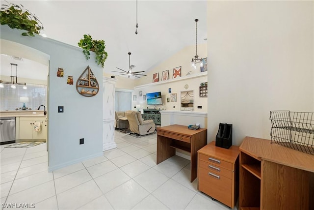 office area with high vaulted ceiling, a ceiling fan, and light tile patterned flooring