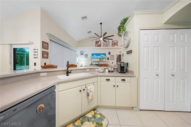 kitchen featuring black dishwasher, sink, light tile patterned floors, lofted ceiling, and ceiling fan