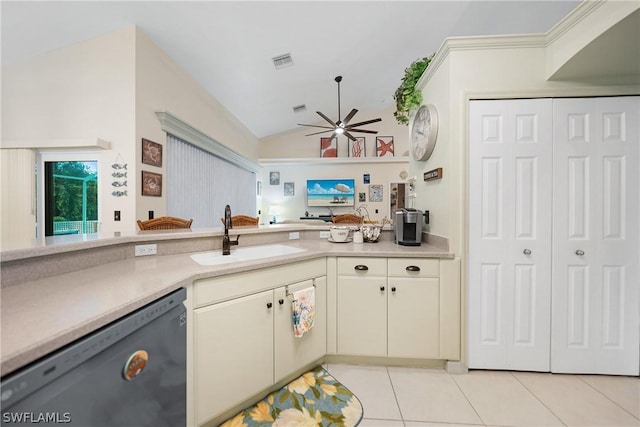 kitchen featuring black dishwasher, light tile patterned floors, light countertops, visible vents, and a sink