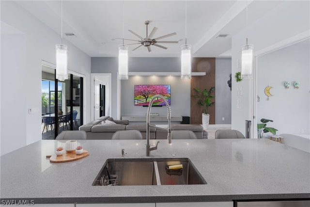 kitchen with pendant lighting and ceiling fan