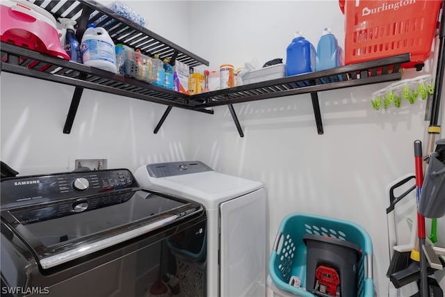 laundry room featuring independent washer and dryer